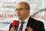 Romanian Envoy Speaks at Anti-Corruption Symposium
