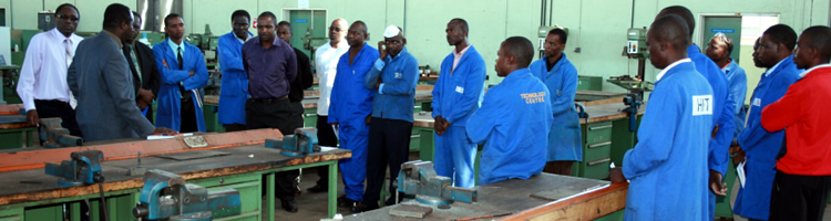 Acting Vice Chancellor Eng. Kanhukamwe addressing Technology Centre staff in the Industrial and Manufacturing Engineering workshop